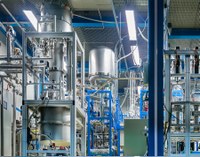 XENONnT reduces radon background to below the neutrino level